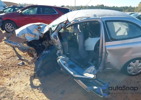 2002 Toyota Echo из США, поврежденный, VIN JTDAT123X20256450